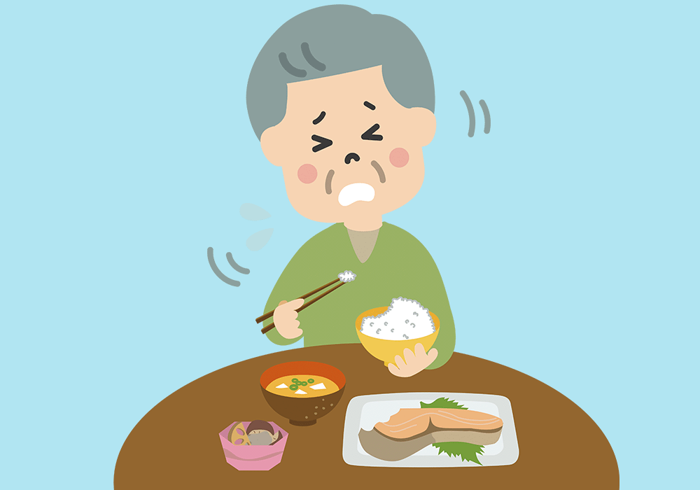 食事中にむせる高齢男性