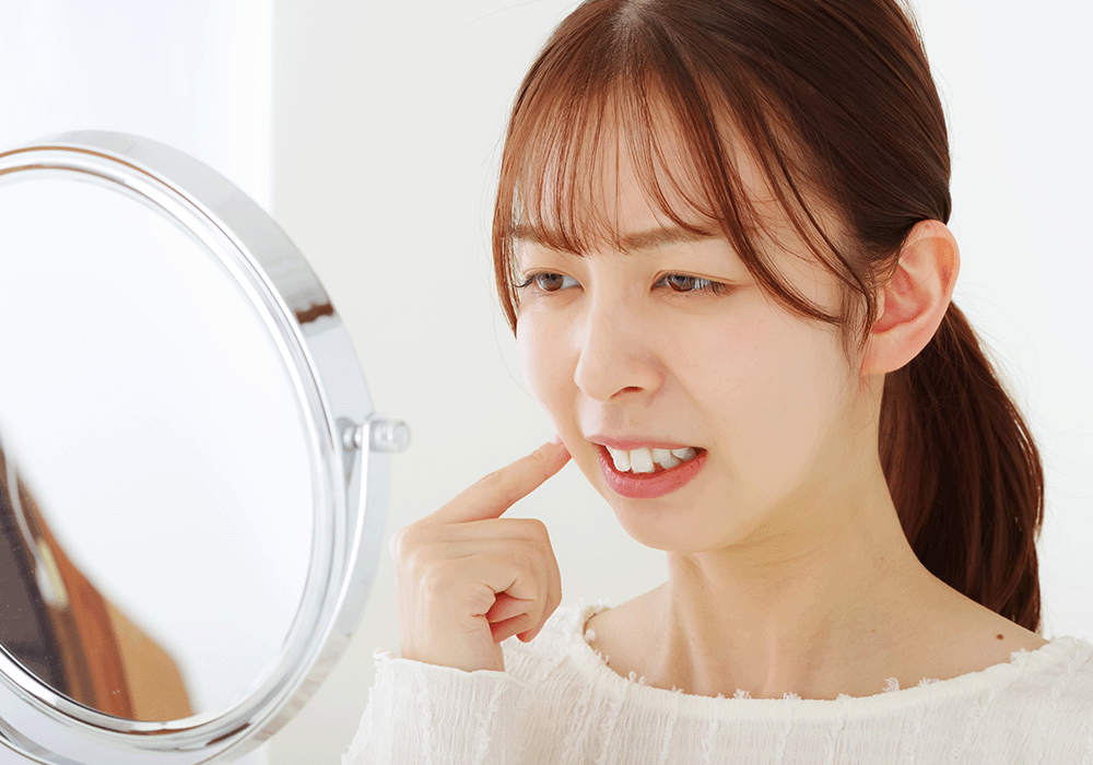 口内炎が痛い女性